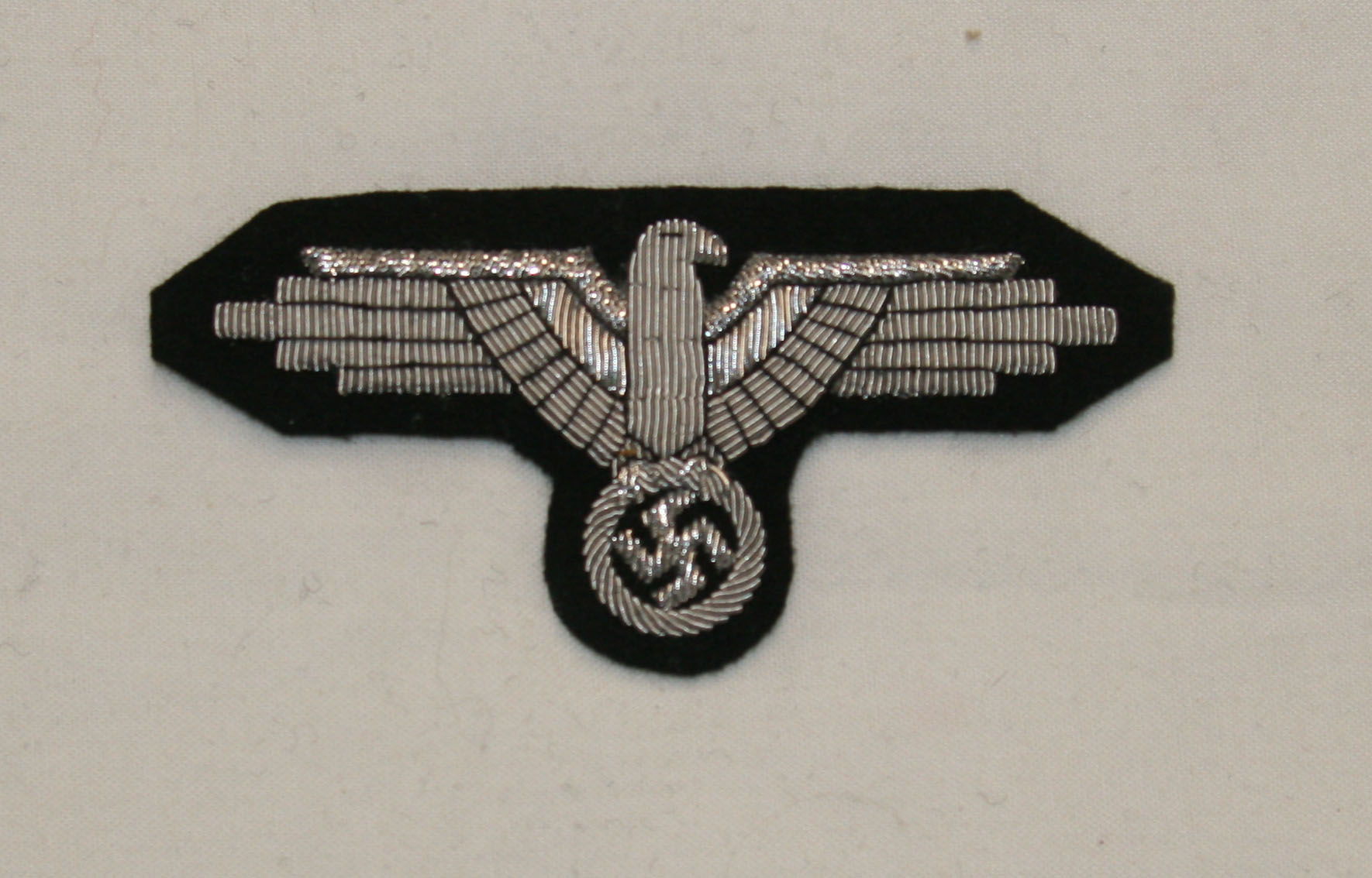Águila de manga de oficial de las SS, lingotes
